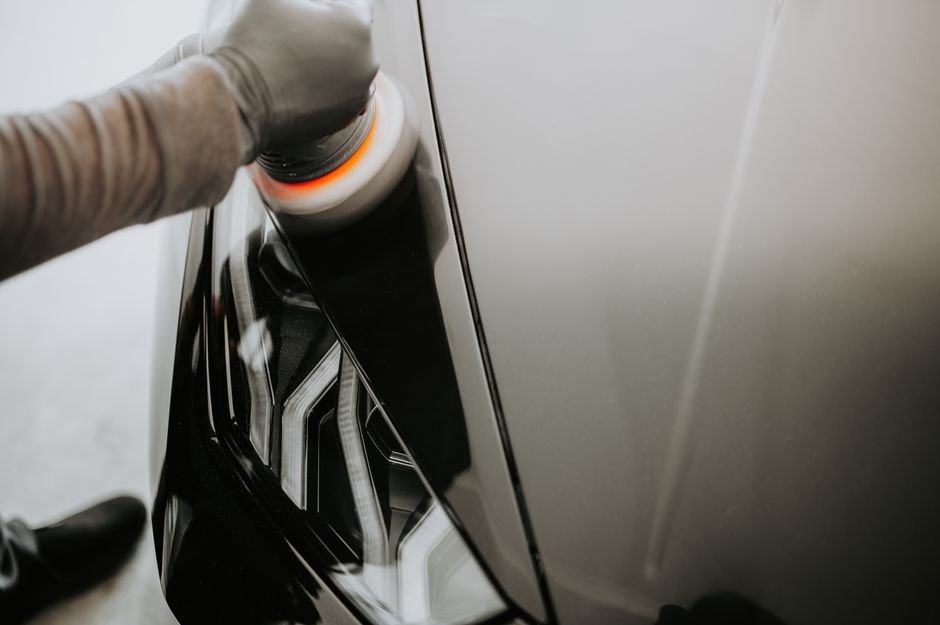 Waxing and polishing car paint to a high gloss